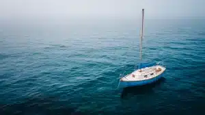 Lone sailboat in the ocean